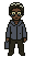 Moss, in a grey hoodie and round glasses